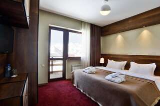 Курортные отели Hotel Carpe Diem Gudauri Гудаури Люкс с 2 спальнями с кроватью размера "king-size"-2