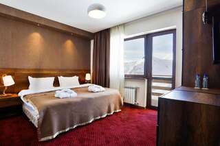Курортные отели Hotel Carpe Diem Gudauri Гудаури Люкс с 2 спальнями с кроватью размера "king-size"-3